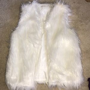 white fur vest
